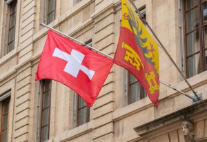 Swiss and Geneva flag floating in the air