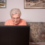 An old woman with a laptop